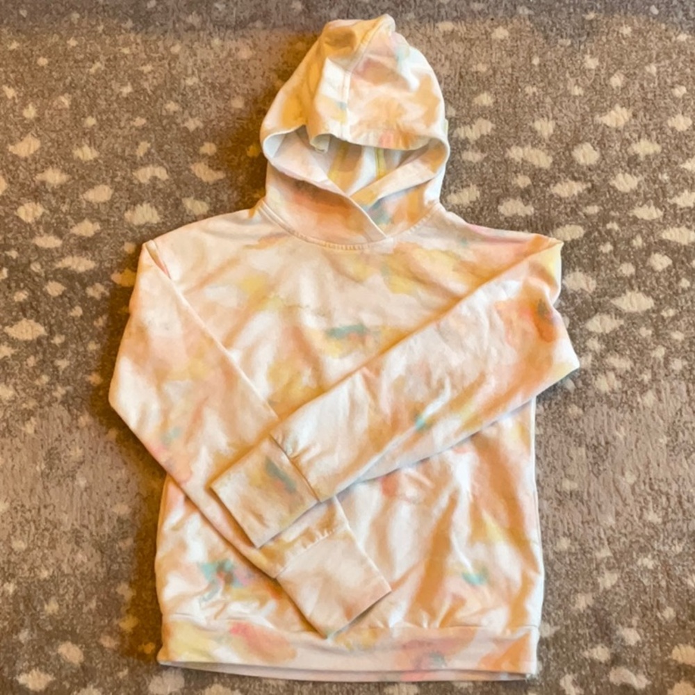 Pink, yellow, blue, and white all in motion sweatshirt.